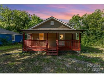Charming single-story home with a cozy front porch and inviting curb appeal at 408 Orange St, Shelby, NC 28150