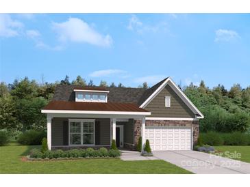 Charming single-Gathering home with stone accents, a covered porch, and attached garage, offering great curb appeal at 5237 Raging Creek Dr, Indian Trail, NC 28079