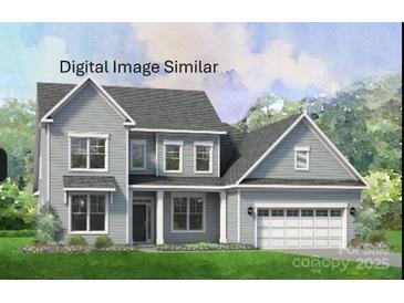 Charming two-story home boasts a classic design, complemented by a two-car garage and well-manicured lawn at 139 Eve Ash Ln # 35, Mooresville, NC 28115