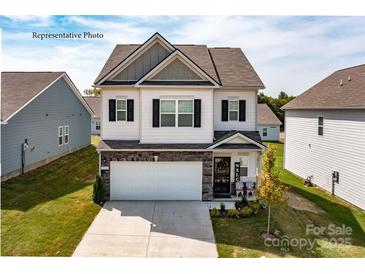 Charming two-story home with a two-car garage and a welcoming front porch, set in a well-maintained community at 1248 Langston Ln, Salisbury, NC 28144