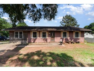 Charming single-story home with a cozy front yard and classic curb appeal at 816 Radio Rd, Statesville, NC 28677