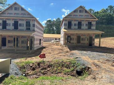 New construction home showcasing the framing and exterior features in a developing community at Tbd S Park Dr, Wadesboro, NC 28170