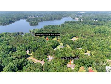 Stunning aerial view of 260 River Country Rd with lake access and community boat ramp at 260 River Country Rd, Salisbury, NC 28146