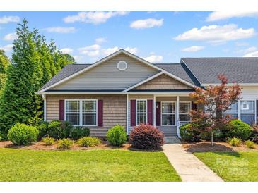 Charming single-story home with well-manicured landscaping and a welcoming front porch at 703 Dalebrook Ln, Rock Hill, SC 29730