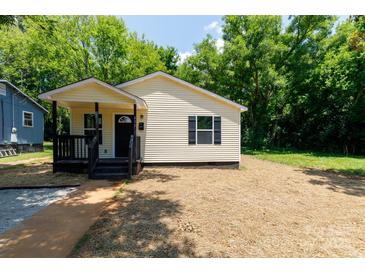 Charming, newly renovated, single-story home with a welcoming front porch and fresh landscaping at 426 Williamson St, Rock Hill, SC 29730