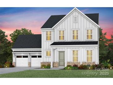 New construction featuring a white facade, black roof, attached garage, and inviting landscaping at 4715 Formation Dr # 047, Lancaster, SC 29720