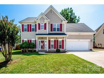 Charming two-story home with well-maintained lawn, red shutters, and an attached two-car garage at 198 Devon Forest Dr, Mooresville, NC 28115