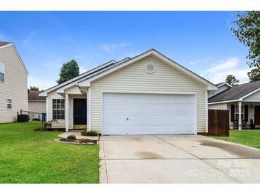 Charming single-Gathering home with a well-maintained lawn and attached two-car garage at 1628 Sandpiper Dr, Rock Hill, SC 29732