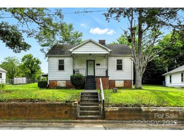Charming single Gathering home with a cozy front porch and inviting curb appeal at 450 1St Se St, Hickory, NC 28602
