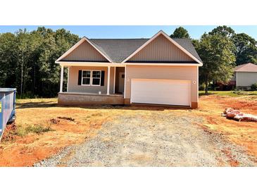 Charming single-Gathering home with a two-car garage, set against a backdrop of lush trees at 3506 14Th Sw Ave, Hickory, NC 28602