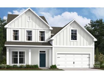Charming two-story home with a white exterior, black door and a two car garage at 1488 Kate Cecil Way, York, SC 29745