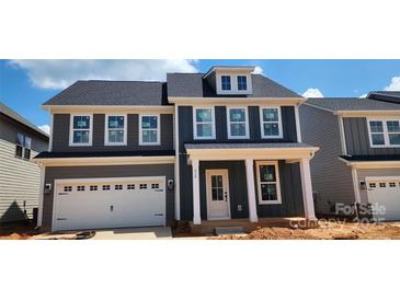 Charming new two-story home with a garage and craftsman-style details at 638 Amberjack Pl # 76, York, SC 29745