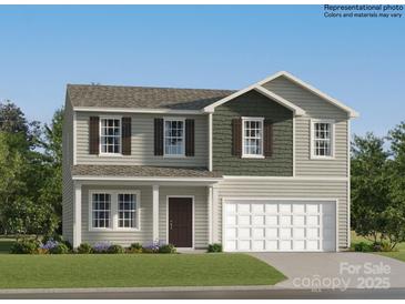 Two-story home featuring mixed siding, a covered porch, and an attached two-car garage at 6391 Fairfax Ct, Maiden, NC 28650