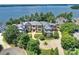 Luxury home on waterfront lot with circular driveway and mature trees at 18019 Harbor Light Blvd, Cornelius, NC 28031