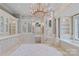 Elegant bathroom features marble accents, custom cabinetry, and spa tub at 18019 Harbor Light Blvd, Cornelius, NC 28031