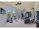 Spacious gym with large windows and a variety of exercise equipment at 18019 Harbor Light Blvd, Cornelius, NC 28031