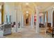 Grand hallway with columns and arches, leading to other rooms at 18019 Harbor Light Blvd, Cornelius, NC 28031