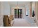 Bright hallway with neutral walls and access to outside deck at 18019 Harbor Light Blvd, Cornelius, NC 28031