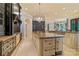 Elegant kitchen features a large center island, custom cabinets, and modern appliances at 18019 Harbor Light Blvd, Cornelius, NC 28031