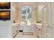 Well-equipped kitchen with ample cabinetry, a large window, and modern appliances at 18019 Harbor Light Blvd, Cornelius, NC 28031