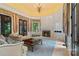 Cozy living room with a fireplace, stylish decor, and high ceilings at 18019 Harbor Light Blvd, Cornelius, NC 28031