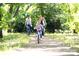Gathering on a shady wooded path perfect for biking at this beautiful new home community at 11318 James Coy Rd # Devonshire, Davidson, NC 28036