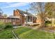 Brick house exterior with a screened porch and deck at 3726 The Plaza None, Charlotte, NC 28205