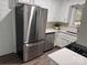 Modern kitchen featuring stainless steel appliances and white shaker cabinets at 3726 The Plaza None, Charlotte, NC 28205