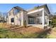 Well-maintained backyard with covered patio, offering relaxation and entertainment at 8159 Fairview Rd, Charlotte, NC 28226
