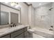 Beautiful bathroom featuring a marble-tiled shower/tub and granite countertops at 8159 Fairview Rd, Charlotte, NC 28226