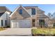 Beautiful brick home featuring an attached two-car garage and well-maintained landscaping at 8159 Fairview Rd, Charlotte, NC 28226