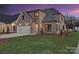 Attractive brick home with a manicured lawn, showcasing its inviting curb appeal at 8159 Fairview Rd, Charlotte, NC 28226