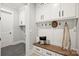 Well-organized mudroom with built-in bench, storage cubbies, coat hooks, and stylish finishes, perfect for Gathering entry at 8163 Fairview Rd, Charlotte, NC 28226