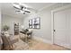 Bright home office with modern desk, comfortable chair, stylish decor, and ample natural light for productivity at 8163 Fairview Rd, Charlotte, NC 28226