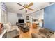 Inviting living room open to the kitchen featuring hardwood floors and neutral color palette at 225 Shore Acres Rd, Salisbury, NC 28146
