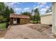 Wooden outbuilding with a brick-paved area and gravel landscaping at 225 Shore Acres Rd, Salisbury, NC 28146