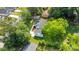 Birds-eye view of a cozy home with a well-maintained lawn, mature trees, and a neatly swept driveway at 506 E Maine Ave, Bessemer City, NC 28016