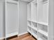 Spacious walk-in closet with ample shelving and storage solutions for organization at 506 E Maine Ave, Bessemer City, NC 28016