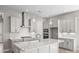 Bright kitchen features stainless steel appliances, a large island, and pendant lighting at 6043 Waldorf Ave, Monroe, NC 28110