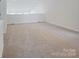 Spacious bedroom with neutral carpet and paint, ready for customization and comfort at 831 Lake Forest Dr # Savanh, Belmont, NC 28012