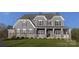Charming two-story home with stone accents, a covered front porch, and a lush green lawn at 841 Lake Forest Dr # Hawthorne, Belmont, NC 28012