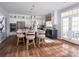 Bright kitchen featuring a large island, white cabinetry, stainless steel appliances, and modern pendant lighting at 841 Lake Forest Dr # Hawthorne, Belmont, NC 28012