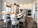 Spacious kitchen with a large island, white cabinets, stainless steel appliances, and modern finishes at 841 Lake Forest Dr # Hawthorne, Belmont, NC 28012