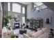 Inviting living room boasts a fireplace, decorative shelving, and an open, airy feel at 841 Lake Forest Dr # Hawthorne, Belmont, NC 28012