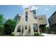 Modern home with stone and wood exterior at 715 Charles Ave, Charlotte, NC 28205