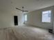 Bright and airy bedroom with hardwood floors and large windows at 719 Charles Ave, Charlotte, NC 28205