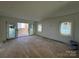 Main bedroom with sliding doors leading to a balcony at 719 Charles Ave, Charlotte, NC 28205