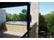 Luxury rooftop pool with wood deck and city views at 719 Charles Ave, Charlotte, NC 28205