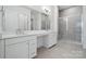 Elegant bathroom with double vanity and walk-in shower at 5217 Glenwalk Dr # 0059, Charlotte, NC 28269