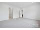 Well-lit bedroom with access to a bathroom at 5217 Glenwalk Dr # 0059, Charlotte, NC 28269